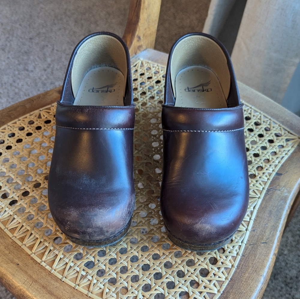 Dansko dark brown leather clogs